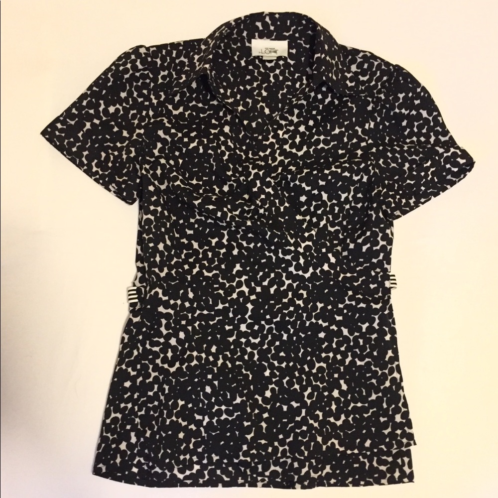 Black and white wrap-around blouse